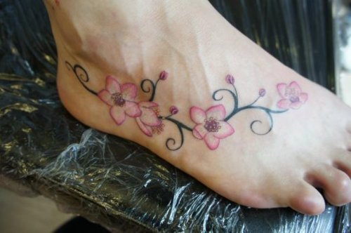 Cool Cherry Blossom Tattoo On Girl Right Foot